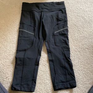 Black lululemon capris with reflective side pockets